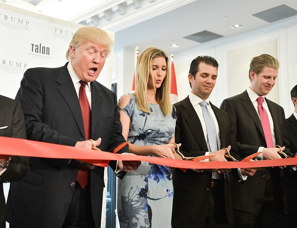 TORONTO, ON - APRIL 16: Donald Trump, Ivanka Trump, Donald Trump Jr. and Eric Trump attend the Grand Opening Ribbon Cutting Ceremony at the Trump International Hotel and Tower Toronto on April 16, 201 ...