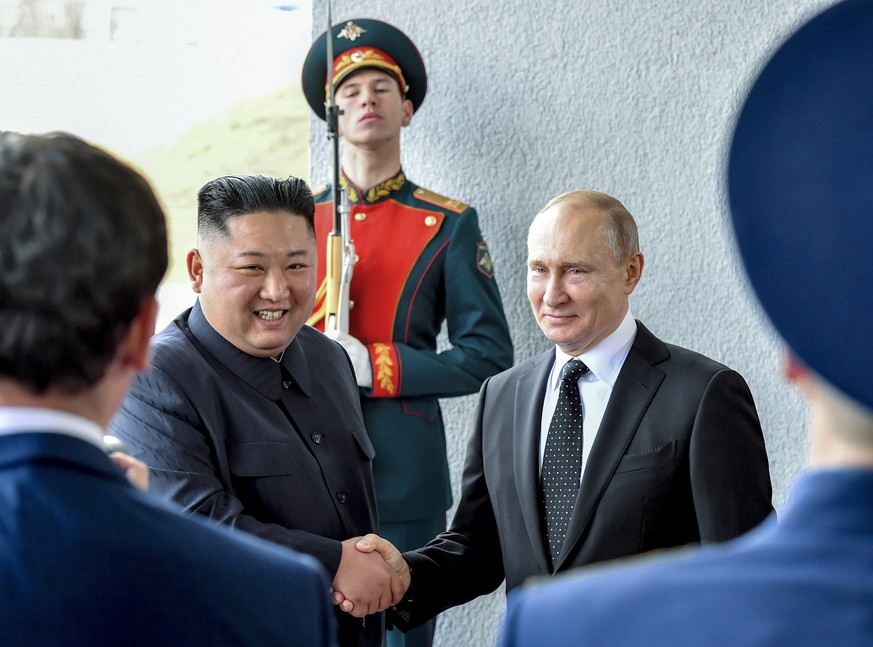 FILE - Russian President Vladimir Putin, center right, and North Korea&#039;s leader Kim Jong Un shake hands during their meeting in Vladivostok, Russia on April 25, 2019. As North Korea conducts more ...