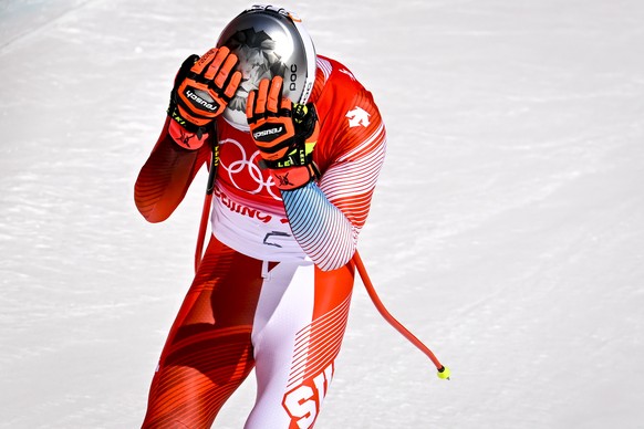 epa09724237 Marco Odermatt of Switzerland reacts during the Men's Downhill Training at the Yanqing National Alpine Skiing Centre for the Beijing 2022 Olympic Winter Games in Beijing, China, 03 Fe ...