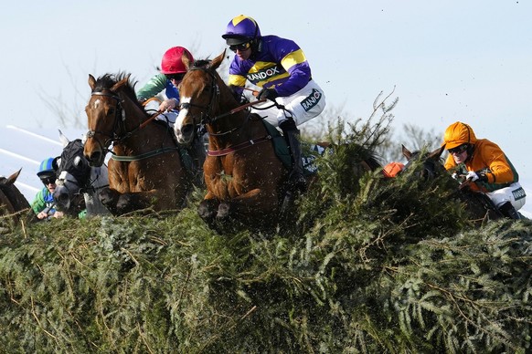 Derek Fox on Corach Rambler clears the Chair fence to win the Grand National horse race at Aintree Racecourse Liverpool, England, Saturday, April 15, 2023. The iconic Grand National race which is run  ...