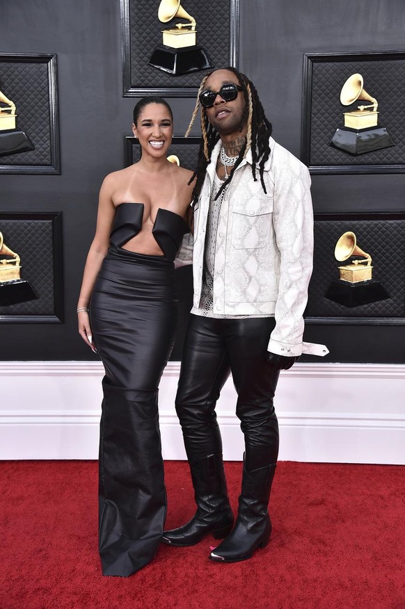 Zalia, left, and Ty Dolla $ign arrive at the 64th Annual Grammy Awards at the MGM Grand Garden Arena on Sunday, April 3, 2022, in Las Vegas. (Photo by Jordan Strauss/Invision/AP)