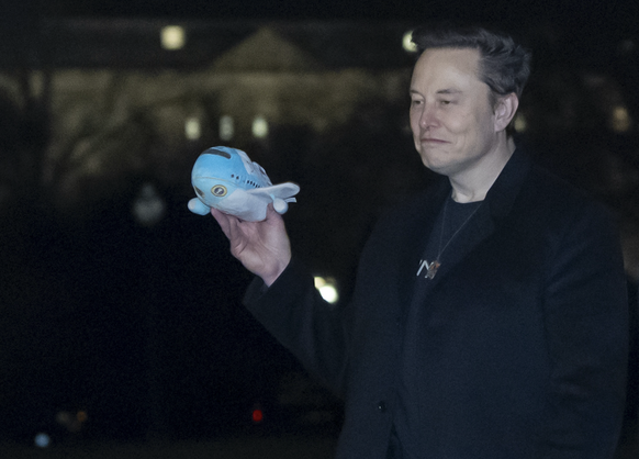 Musk, avec une peluche Air Force One