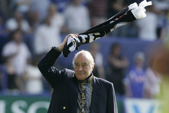 Fulham&#039;s chairman Mohamed Al-Fayed celebrates his team win against Portsmouth to retain their place in Premier League at the end of their English Premier League soccer match at Fratton Park, Port ...