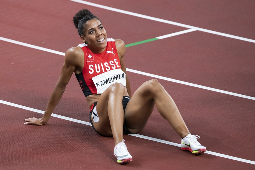 Mujinga Kambundji of Switzerland reacts after the women&#039;s athletics 200m semi final at the 2020 Tokyo Summer Olympics in Tokyo, Japan, on Monday, August 02, 2021. (KEYSTONE/Peter Klaunzer)