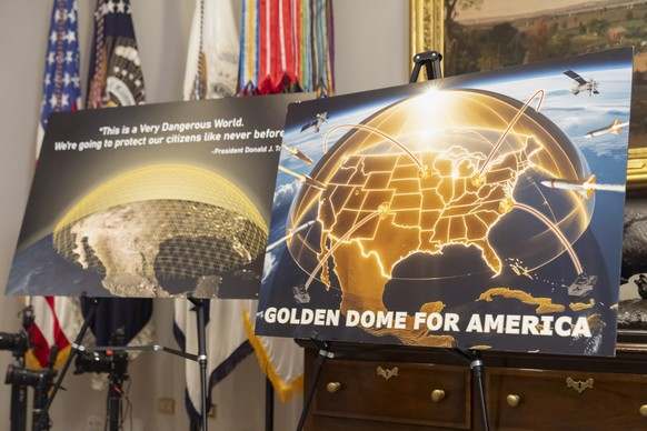Posters for the proposed Golden Dome for America missile defense shield are displayed before an event with President Donald Trump in the Roosevelt Room at the White House, Monday, May 12, 2025, in Was ...