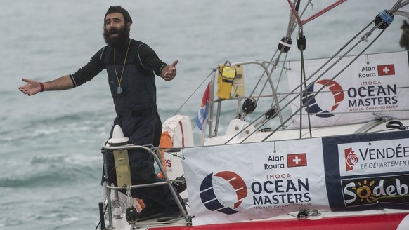 Swiss skipper Alan Roura onboard of the monohull IMOCA &quot;La Fabrique&quot; SUI7 after finishing 12th in the Vendee Globe solo around-the-world sailing race in Les Sables d&#039;Olonne harbor, west ...