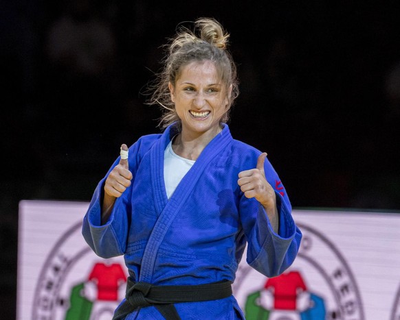 epa09253733 Fabienne Kocher of Switzerland celebrates after defeating Joana Ramos of Portugal in their bronze medal bout of the women&#039;s 52kg category at the World Judo Championships in Budapest,  ...