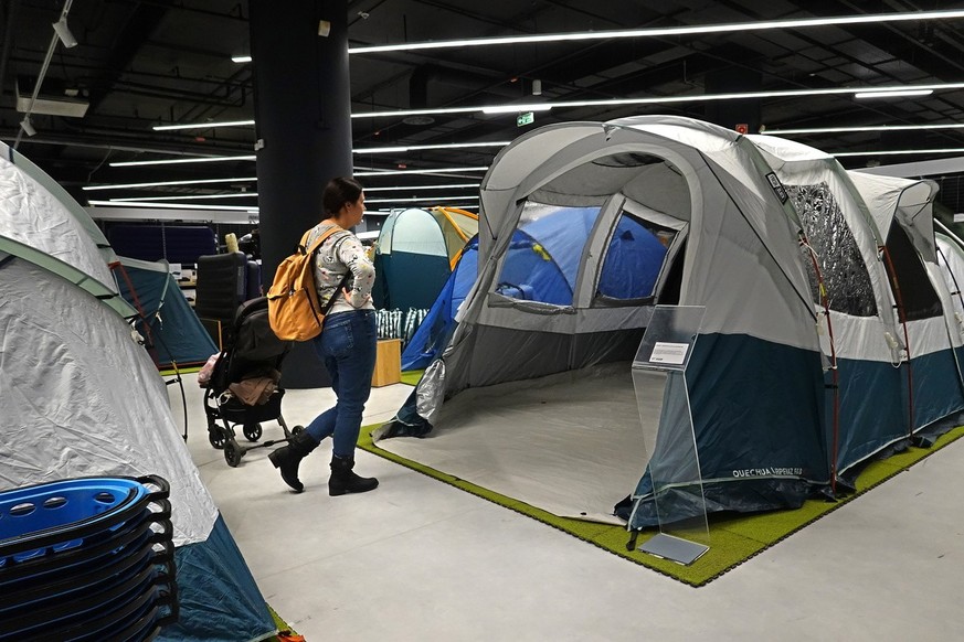 epa11005513 People shop for sports and outdoor goods at the first store of the 'Desport' chain of Russian company ARM, formerly Decathlon, at the Aviapark shopping mall in Moscow, Russia, 01 ...