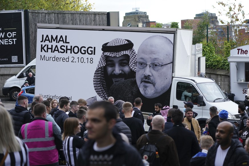 A van with a protest poster highlights Saudi human rights violations, including the 2018 killing of journalist Jamal Khashoggi in the Saudi Consulate in Istanbul outside the ground before an English P ...