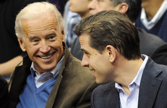epa07872755 (FILE) - Then US Vice President Joe Biden (L) and his son Hunter Biden attend a college basketball game, at the Verizon Center in Washington, DC, USA, 30 January 2010 (reissued 27 Septembe ...