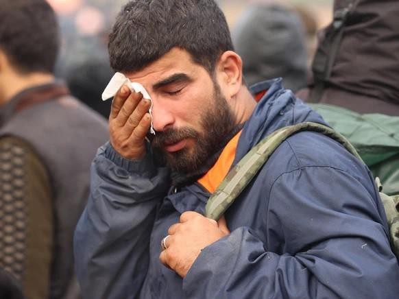 Un migrant à la frontière. Cette photo a été fournie par Belta, l'agence de presse publique biélorusse.