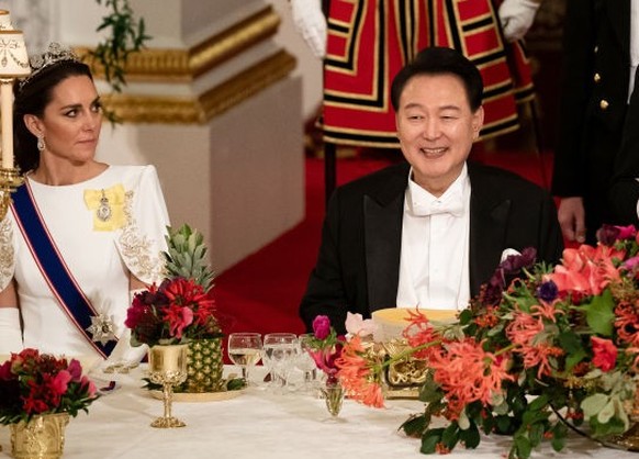 South Korean President state visit to the UK President of South Korea Yoon Suk Yeol listens as King Charles III speaks at the state banquet at Buckingham Palace, London, for the state visit to the UK ...