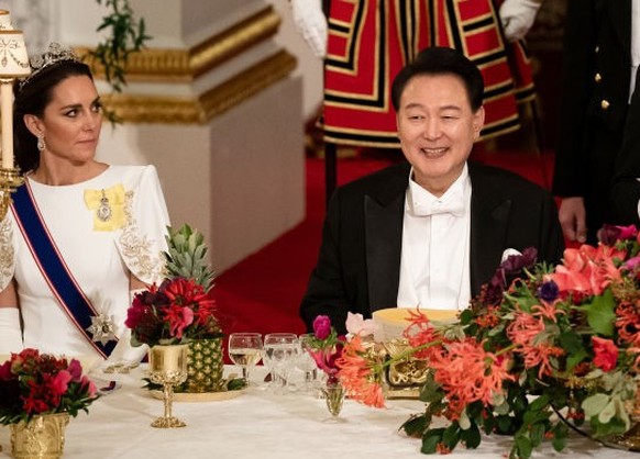 South Korean President state visit to the UK President of South Korea Yoon Suk Yeol listens as King Charles III speaks at the state banquet at Buckingham Palace, London, for the state visit to the UK  ...