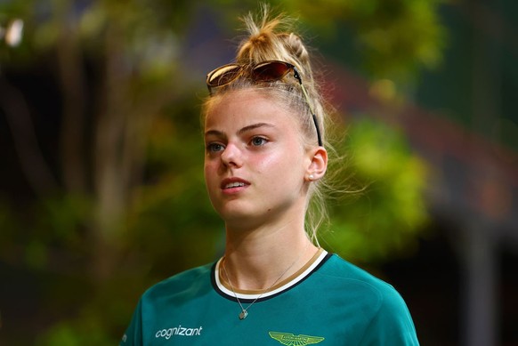 SINGAPORE, SINGAPORE - SEPTEMBER 19: Tina Hausmann of Switzerland and PREMA Racing (19) walks in the Paddock during previews ahead of F1 Academy Round 5 at Marina Bay Street Circuit on September 19, 2 ...