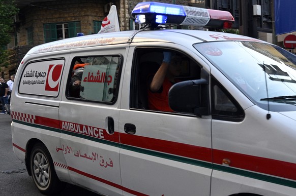 epa11610019 An ambulance arrives at the American University of Beirut Medical Center (AUBMC) after an incident involving Hezbollah members