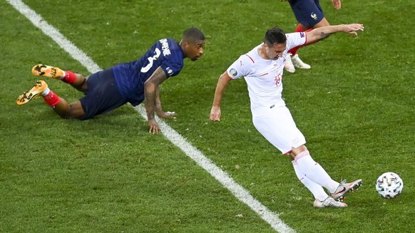 Switzerland&#039;s Mario Gavranovic scores his team&#039;s third goal during the Euro 2020 soccer championship round of 16 match between France and Switzerland at National Arena stadium, Bucharest, Ro ...