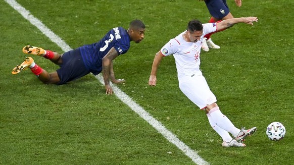 Switzerland&#039;s Mario Gavranovic scores his team&#039;s third goal during the Euro 2020 soccer championship round of 16 match between France and Switzerland at National Arena stadium, Bucharest, Ro ...