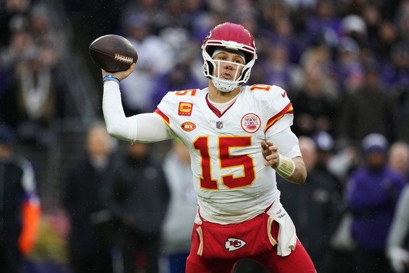 Kansas City Chiefs quarterback Patrick Mahomes (15) looks to pass during the first half of the AFC Championship NFL football game against the Baltimore Ravens, Sunday, Jan. 28, 2024, in Baltimore. (AP ...