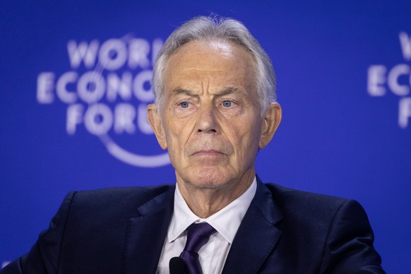 epa12194078 Sir Tony Blair, former Prime Minister of the United Kingdom and Executive Chairman of the Tony Blair Institute for Global Change, participates in a session at the World Economic Forum Annu ...
