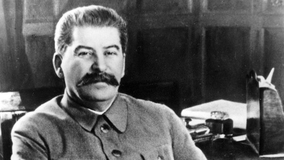 ** FILE ** Josef Stalin, secretary-general of the Communist Party of the Soviet Union and premier of the Soviet state, poses at his desk in the Kremlin, Moscow, in an election photo issued in Feb. 195 ...