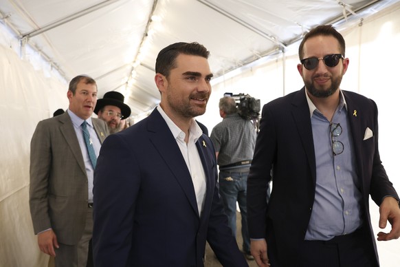 FILE - Ben Shapiro, center, leaves the Ohel Chabad-Lubavitch after a visit from Republican presidential nominee former President Donald Trump, Oct. 7, 2024, in New York. (AP Photo/Yuki Iwamura, File)
 ...