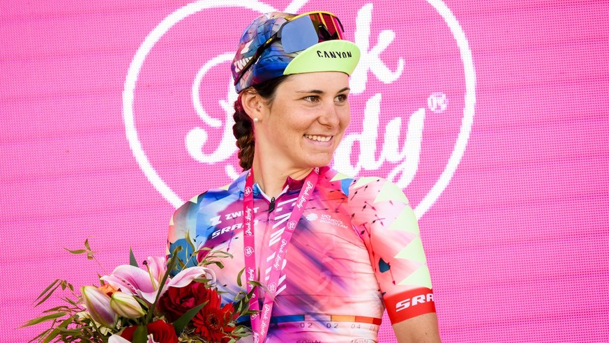 Elise Chabbey from Switzerland of team Canyon-SRAM celebrates on the podium during the 8th stage of the Tour de France women's cycling race over 123,3 kms from Lure to La Super Planche des Belles Fill ...