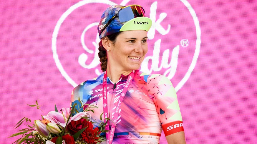 Elise Chabbey from Switzerland of team Canyon-SRAM celebrates on the podium during the 8th stage of the Tour de France women&#039;s cycling race over 123,3 kms from Lure to La Super Planche des Belles ...