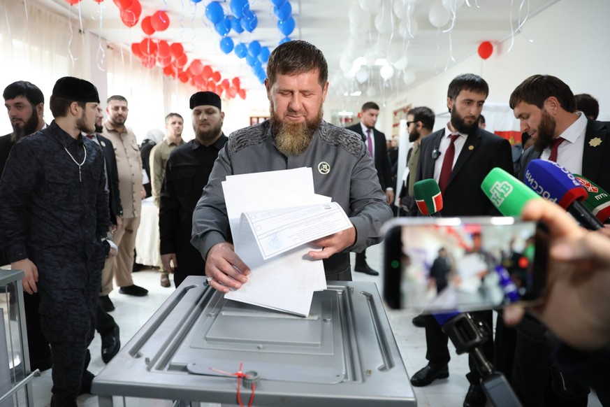 Russia Regions Parliamentary Election 9245955 18.09.2026 Head of the Chechen Republic Ramzan Kadyrov casts his ballot at a polling station during elections to Russia s ninth State Duma, the lower hous ...