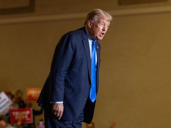 CLAREMONT, NEW HAMPSHIRE - NOVEMBER 11: Republican presidential candidate former President Donald Trump yells to the crowd before delivering remarks during a campaign event on November 11, 2023 in Cla ...