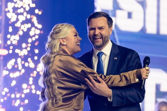 Erika Kirk greets Vice President JD Vance during Turning Point USA's AmericaFest 2025, Sunday, Dec. 21, 2025, in Phoenix. (AP Photo/Jon Cherry)
APTOPIX Turning Point