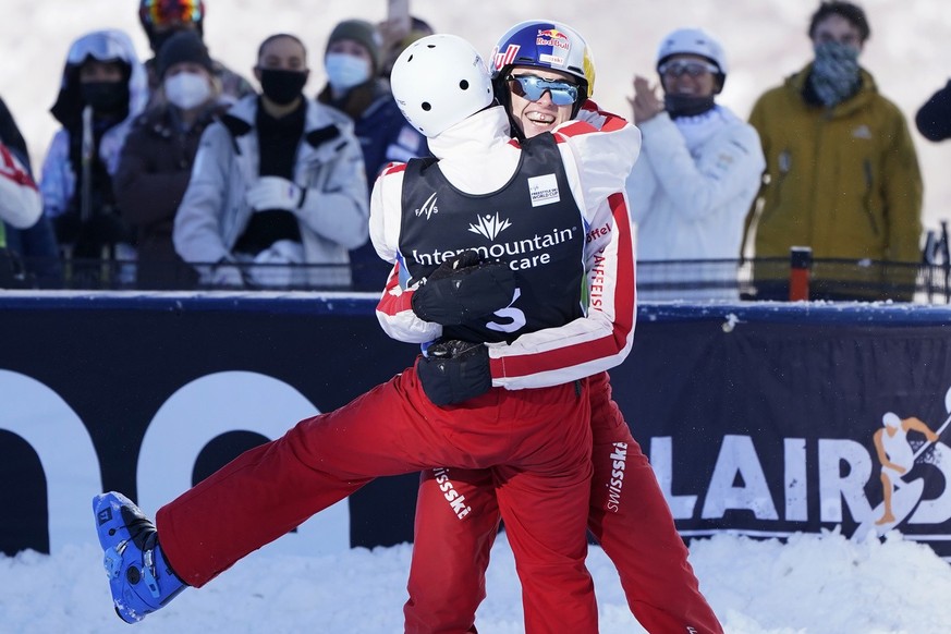 Switzerland&#039;s Noe Roth, facing, celebrates with Pirmin Werner after competing in the World Cup men&#039;s freestyle aerials skiing event, Saturday, Feb. 6, 2021, in Deer Valley, Utah. (AP Photo/R ...