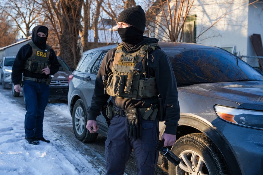 Federal agents conduct immigration enforcement operations, on Tuesday, Feb. 3, 2026, in Minneapolis. (AP Photo/Ryan Murphy)
Immigration Enforcement Minnesota