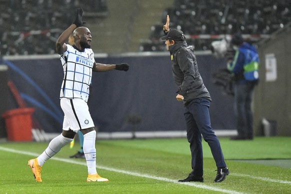 Le buteur et son mentor.