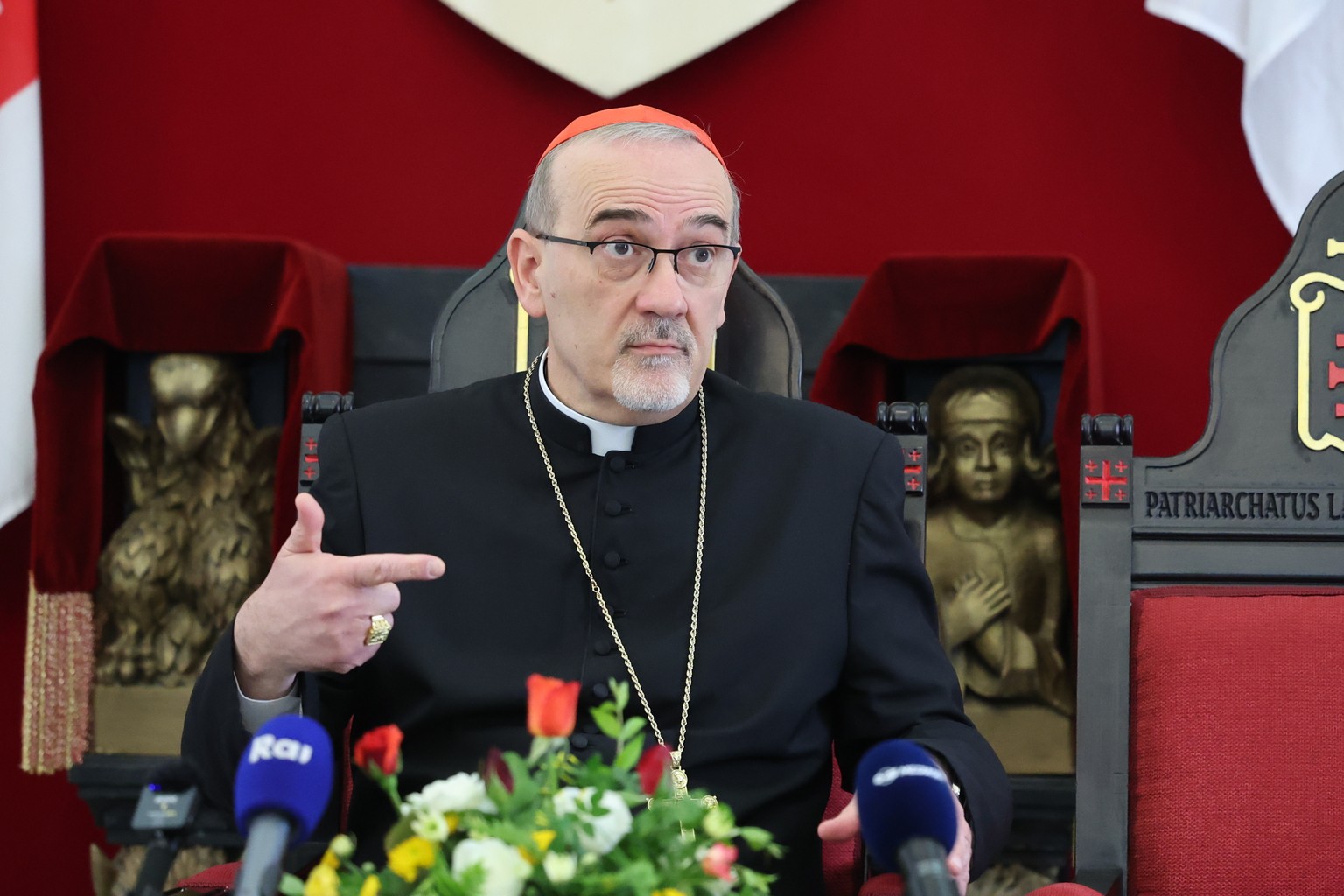 epa12046125 Latin Patriarch of Jerusalem, Archbishop Pierbattista Pizzaballa speaks during a press conference at the Latin Catholic patriarchate at the Old City of Jerusalem, 22 April 2025. Pope Franc ...