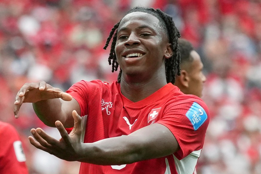 Switzerland's Johan Manzambi (9) celebrates after scoring during the World Cup Group B soccer match between Switzerland and Canada in Vancouver, British Columbia, Wednesday, June 24, 2026. (AP Ph ...