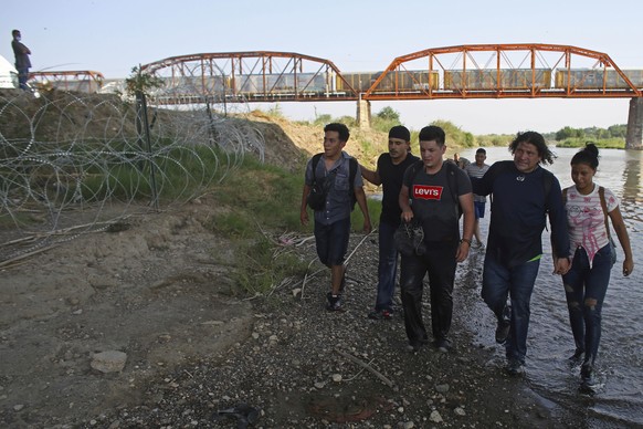 Migrants, mostly from Nicaragua cross the Rio Grande river into the United States in Eagle Pass, Texas. Friday, May 20, 2022. The Eagle Pass area has become increasingly a popular crossing corridor fo ...