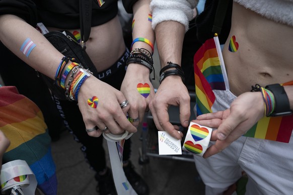 epa11412120 People take part in the Zurich Pride parade as part of Zurich Pride Festival 2024 in Zurich, Switzerland, 15 June 2024. June is celebrated around the world as the Pride Month. EPA/CHRISTIA ...