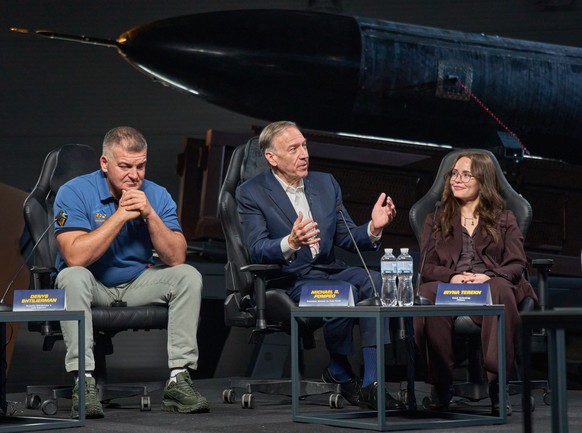 Former U.S. Secretary of State Mike Pompeo, center, who has joined the advisory board of Ukraine's leading defense company Fire Point, co-founder and chief designer Denys Shtilerman, left, and Ch ...