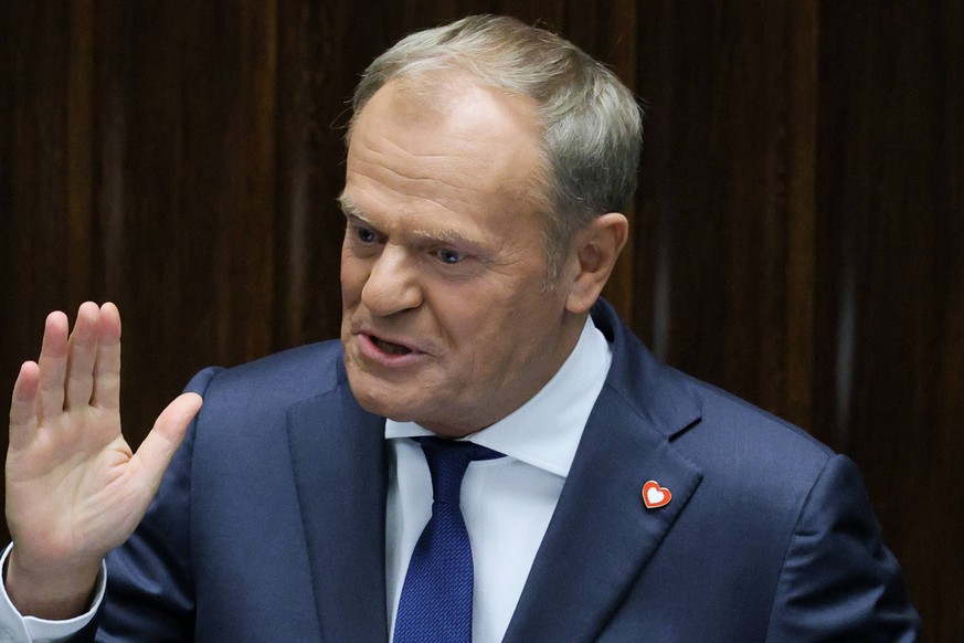 epa12169526 Poland&#039;s Prime Minister Donald Tusk delivers a policy speech to the lower house and asks parliament for a vote of confidence to reaffirm support for his government at the Sejm buildin ...
