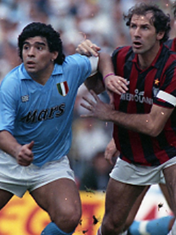 epa08841994 (FILE) - File picture dated 21 October 1990 showing Diego Maradona (L) of Napoli in action against Franco Baresi of AC Milan during the Italian Serie A match between Napoli and AC Milan in ...