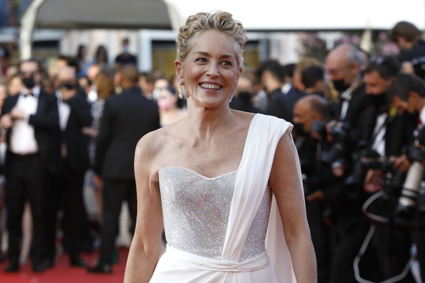 epa09350671 Sharon Stone arrive for the Closing Awards Ceremony of the 74th annual Cannes Film Festival, in Cannes, France, 17 July 2021. The Golden Palm winning movie will be screened after the closi ...