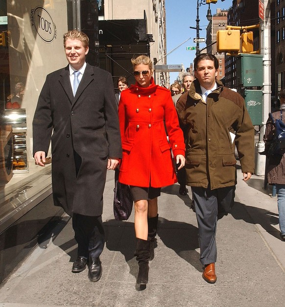 NEW YORK - MARCH 30: (ITALY OUT, NY DAILY NEWS OUT, NY NEWSDAY OUT) (L-R) Eric Trump, Ivanka Trump and Donald Trump Jr. walk through midtown on March 30, 2007 in New York City. (Photo by Arnaldo Magna ...