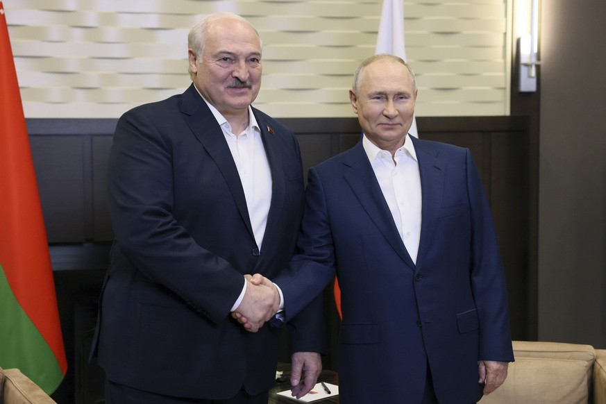 Russian President Vladimir Putin, right, and Belarusian President Alexander Lukashenko shake hands during their meeting in Sochi, Russia, Friday, Sept. 15, 2023. (Mikhail Metzel, Sputnik, Kremlin Pool ...