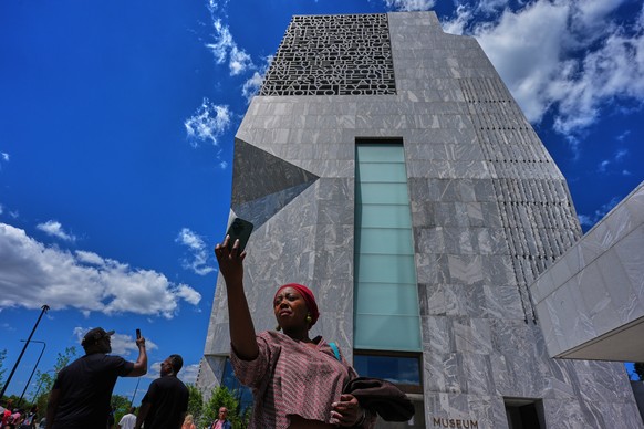 Belinda Chanda from Zambia, takes a selfie in front of Museum building at the Obama Presidential Center, Friday, June 19, 2026, in Chicago. (AP Photo/Nam Y. Huh)
Belinda Chanda