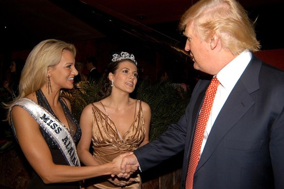 NEW YORK CITY, NY - APRIL 18: (L-R) Leeann Tingley Miss Rhode Island, Chelsea Cooley Miss USA 2005 and Donald Trump attend &quot;The Miss Universe Guide to Beauty&quot; Book Launch Hosted by Donald Tr ...