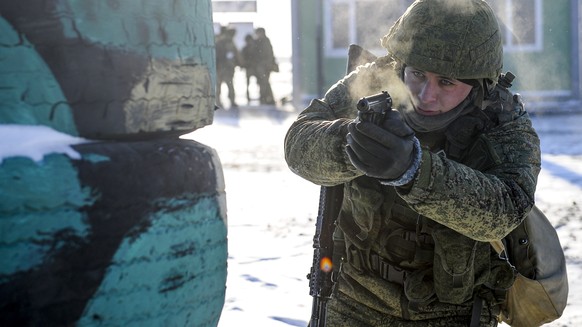 FILE - A Russian soldier takes part in drills at the Kadamovskiy firing range in the Rostov region in southern Russia, Dec. 22, 2021. With Russia carrying out a massive military buildup near Ukraine a ...