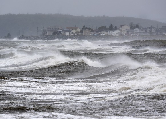 Waves pound the shore in Eastern Passage, N.S. on Saturday, Sept. 24, 2022. Strong rains and winds lashed the Atlantic Canada region as Fiona closed in early Saturday as a big, powerful post-tropical  ...