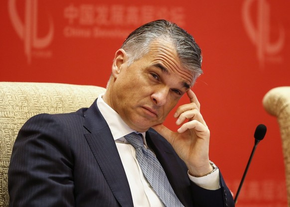 epa04672335 Sergio P. Ermotti, Group CEO of UBS AG, attends the economic summit meetings of the China Development Forum 2015 at the Diaoyutai Guesthouse in Beijing, China 21 March 2015. The forum is h ...