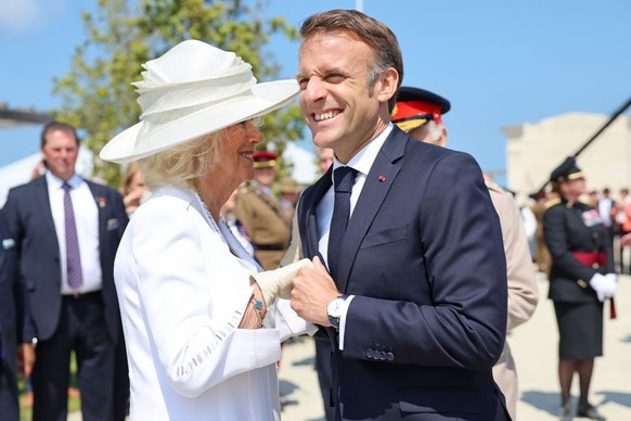VER-SUR-MER, FRANCE - JUNE 06: Queen Camilla and President of France, Emmanuel Macron attend the UK Ministry of Defence and the Royal British Legion’s commemorative event at the British Normandy Memor ...