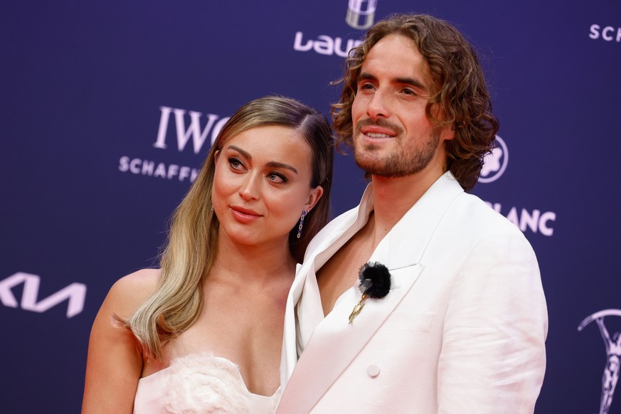 epa12045241 Greek tennis player Stefanos Tsitsipas (R) and Spanish tennis player Paula Badosa (L) pose poses upon arriving at the 2025 Laureus World Sports Awards ceremony, at the Cibeles Palace in Ma ...